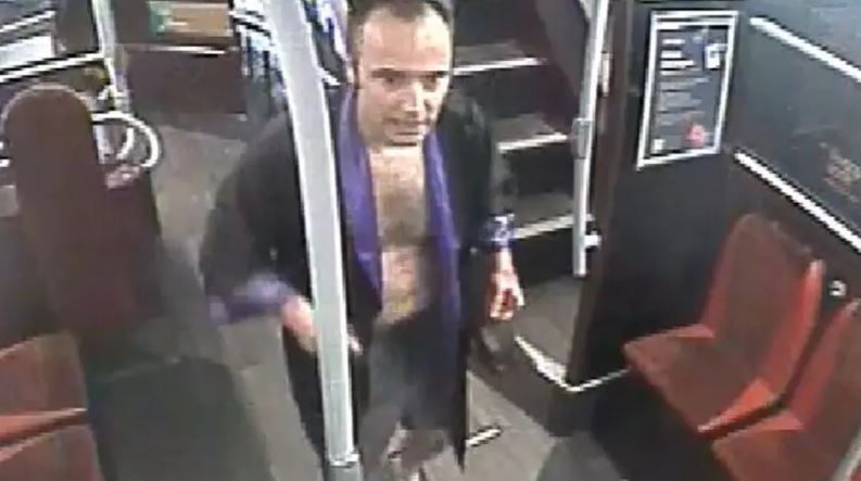 Surveillance image of John Baldwin on a bus.