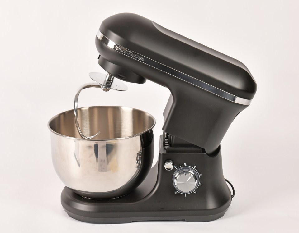 Black Open Kitchen stand mixer with a stainless steel bowl and dough hook.