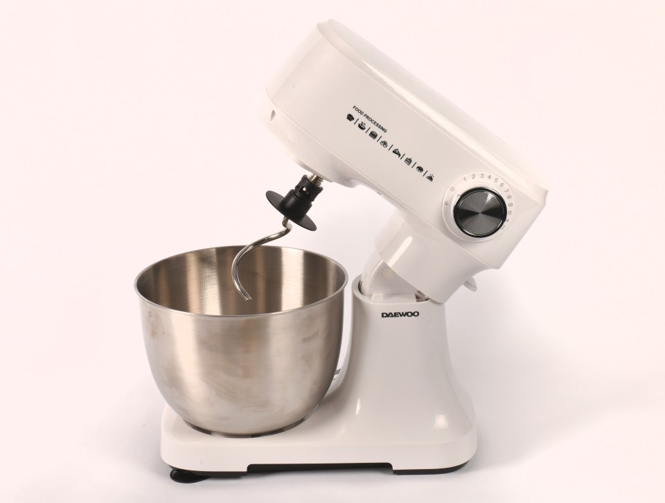 White Daewoo stand mixer with stainless steel bowl.