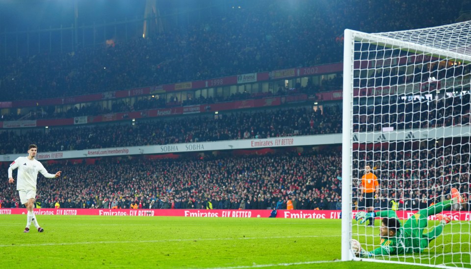 Kai Havertz's penalty kick being saved by Manchester United's goalkeeper.