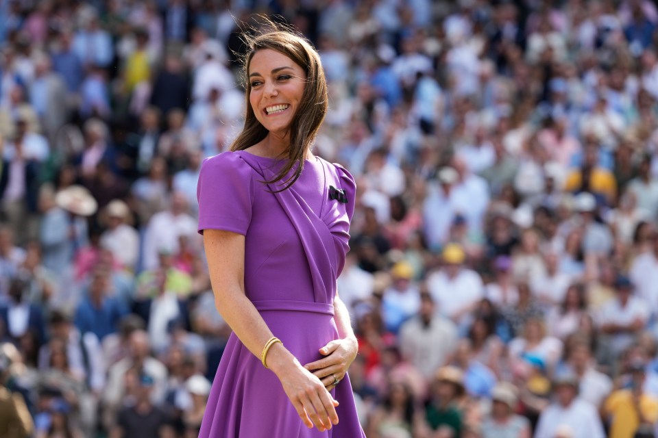 Kate, Princess of Wales, smiles at Wimbledon.