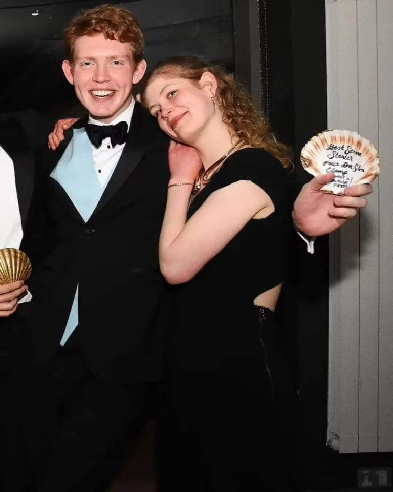 Lady Louise and Felix da Silva-Clamp at an after-party, holding awards.