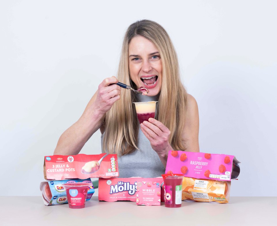 Woman eating layered jelly dessert.