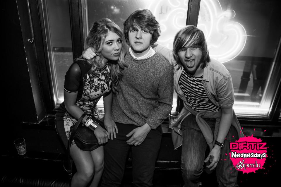 Lewis Capaldi, Paige Turley, and a third person posing together.