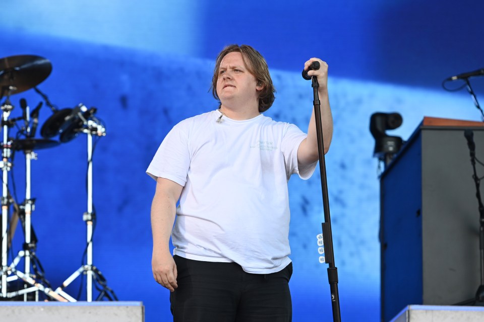 Lewis Capaldi performing at a music festival.