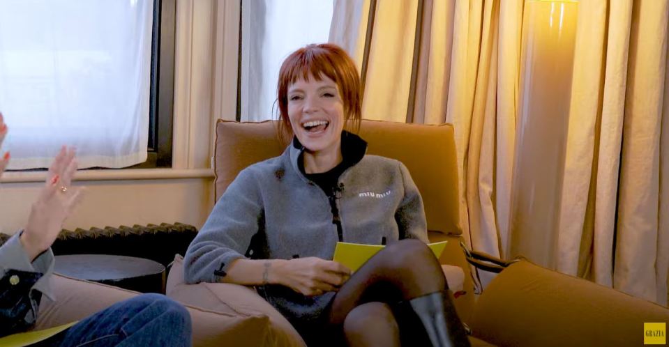 Lily Allen laughing during an interview.