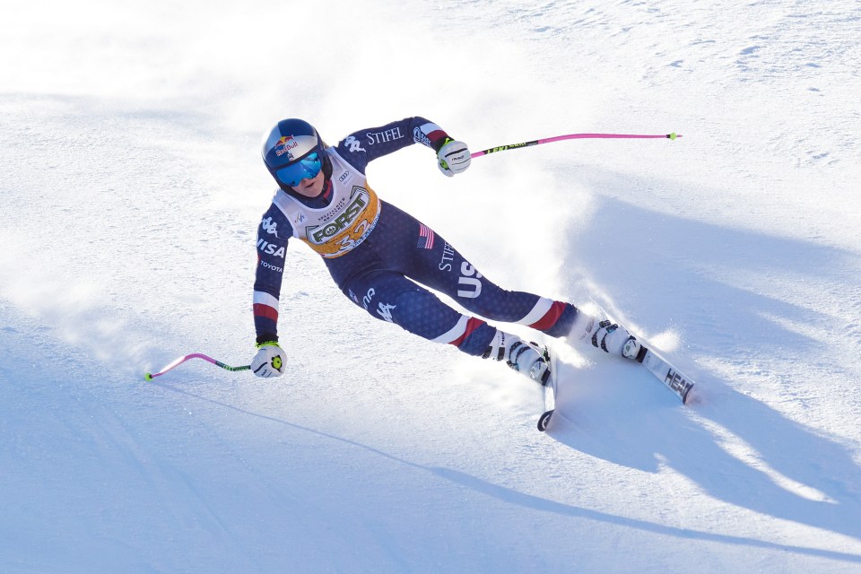 Lindsey Vonn skiing downhill.