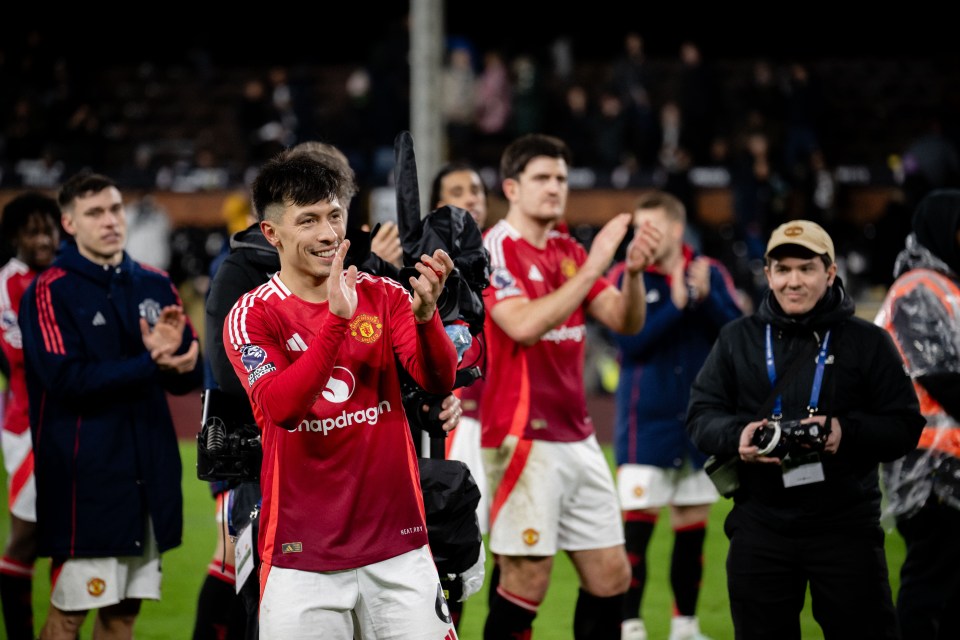 Lisandro Martínez of Manchester United applauding fans after a match.