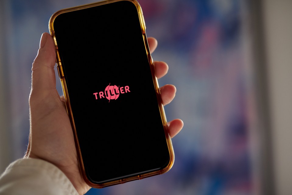 Smartphone displaying the Triller logo.