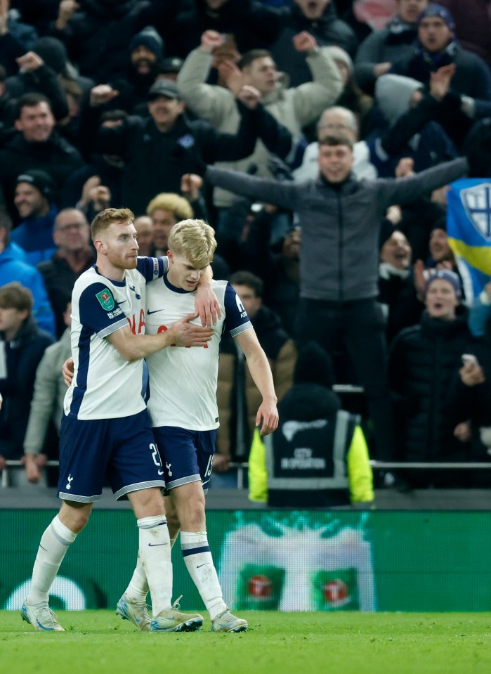 Lucas Bergvall and Dejan Kulusevski of Tottenham Hotspur celebrating a goal.