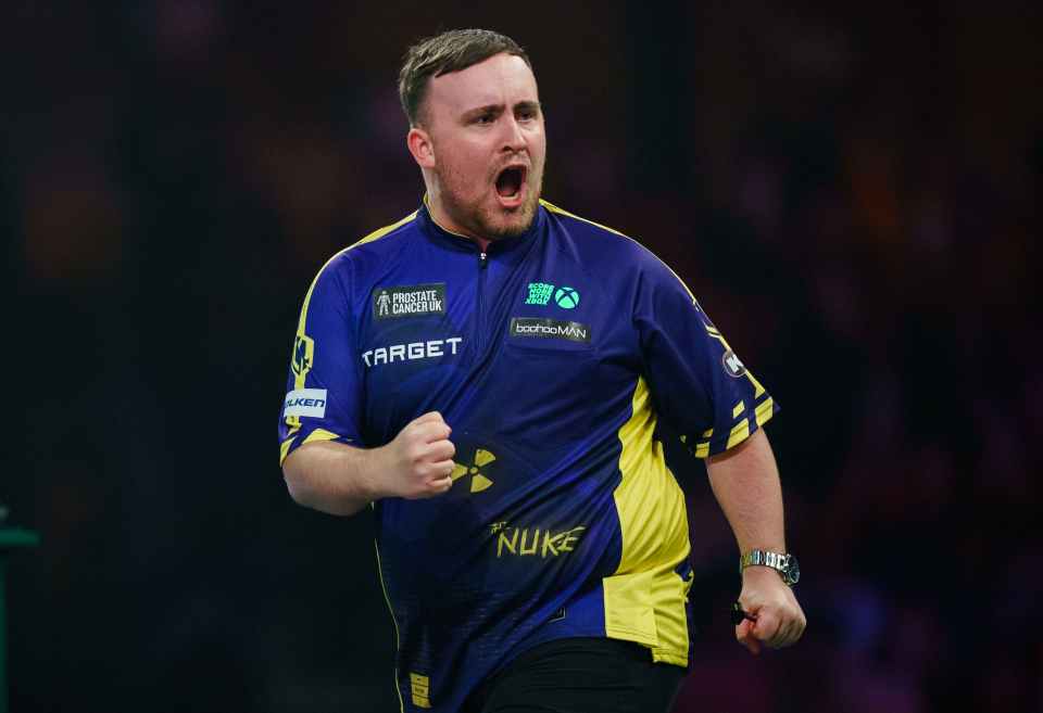 Luke Littler celebrating at the Paddy Power World Darts Championship.