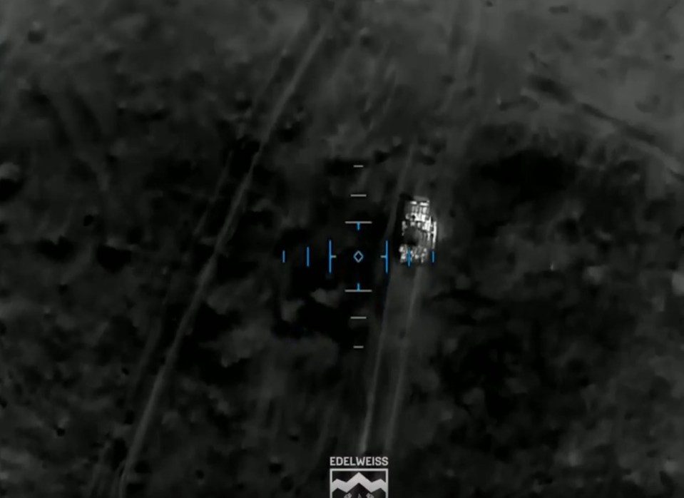 Night vision footage of a drone strike on a Russian motorcycle column.