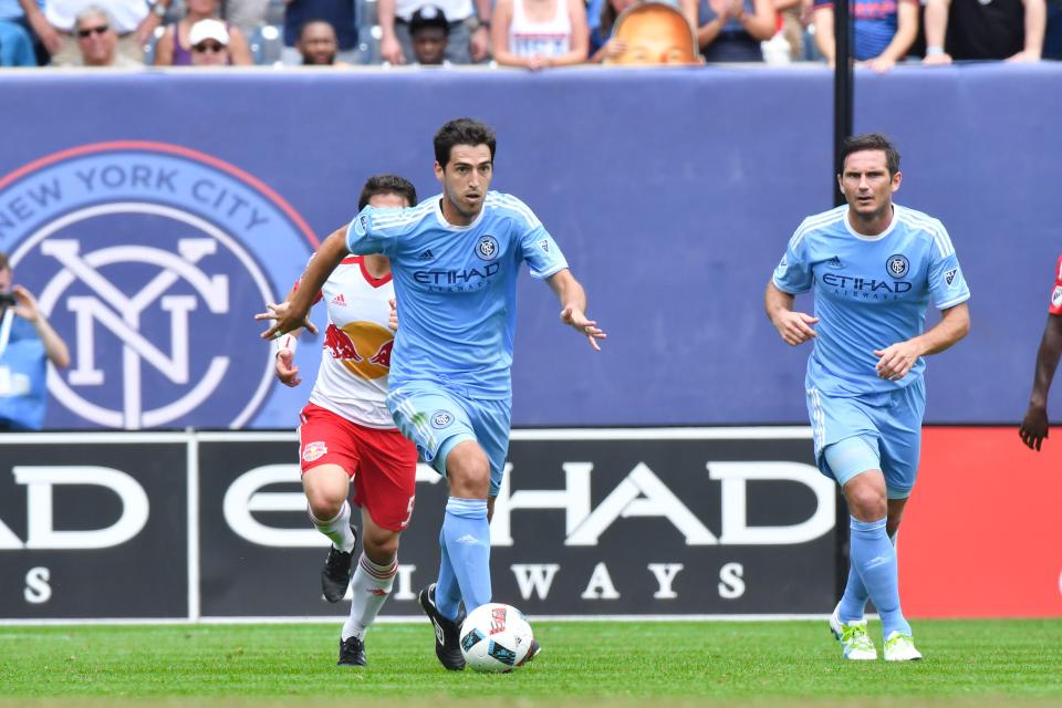 New York City FC soccer players Frank Lampard and Andoni Iraola during a game.