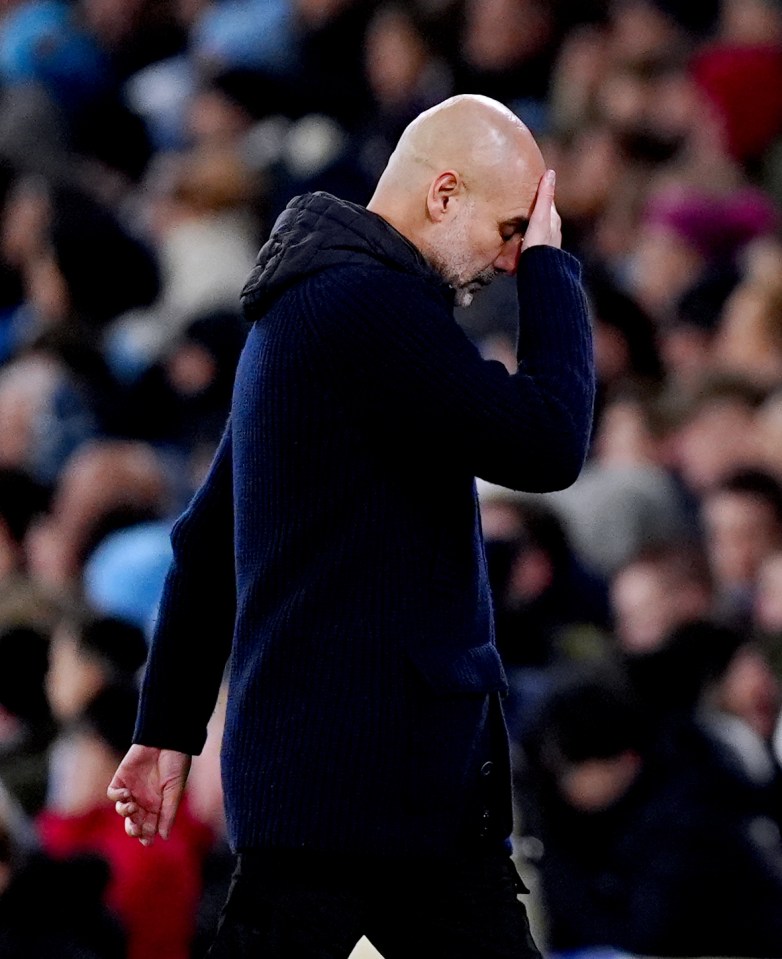 Pep Guardiola looking distressed.