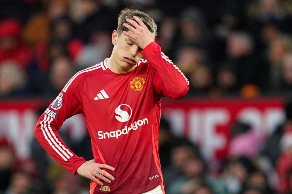 Alejandro Garnacho of Manchester United looks dejected after missing a scoring opportunity.