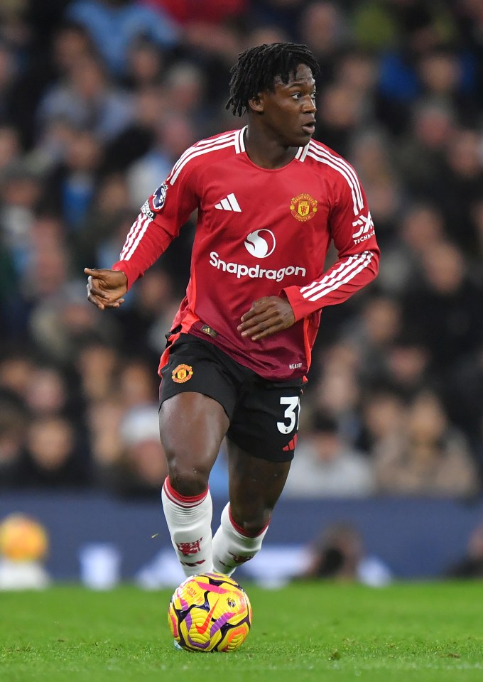 Manchester United's Kobbie Mainoo playing soccer.