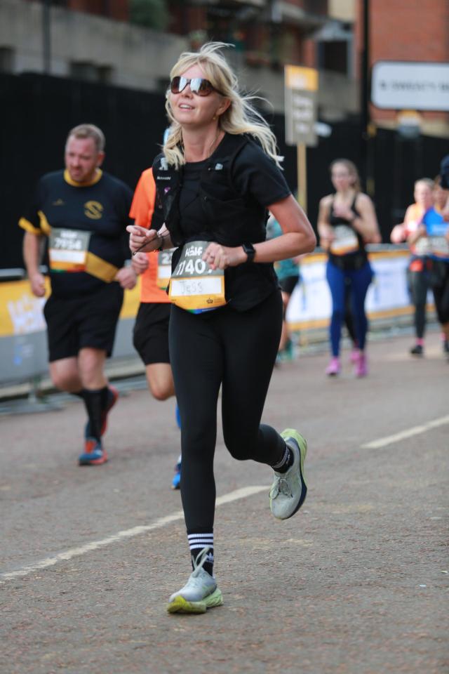 Woman running a marathon.