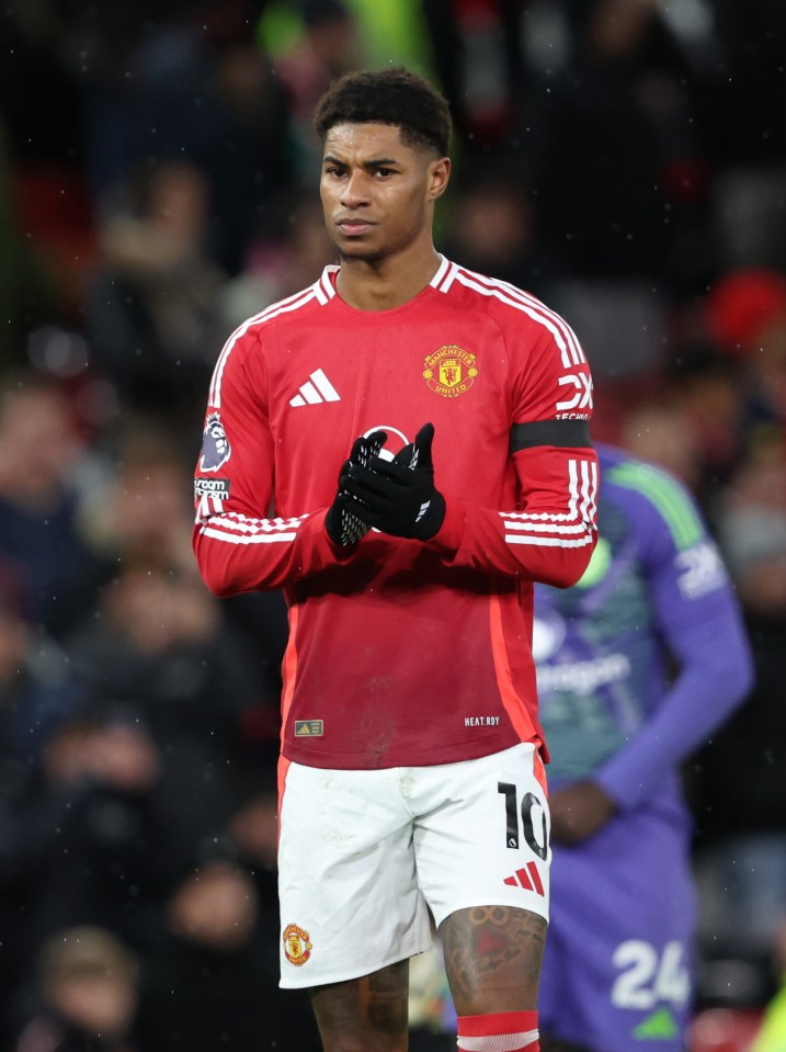 Marcus Rashford of Manchester United applauds fans after a game.