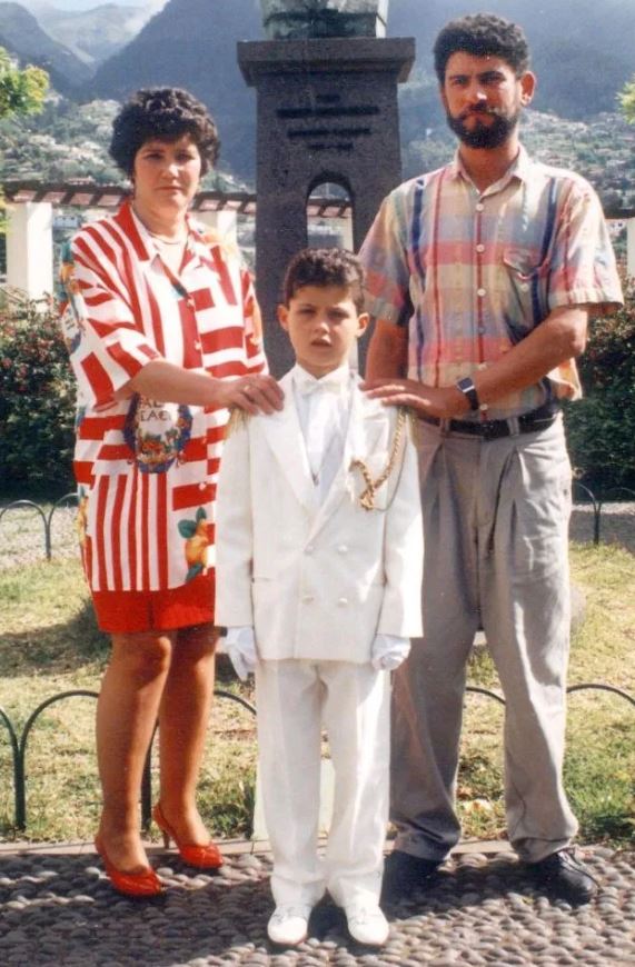 Young Cristiano Ronaldo with his parents.