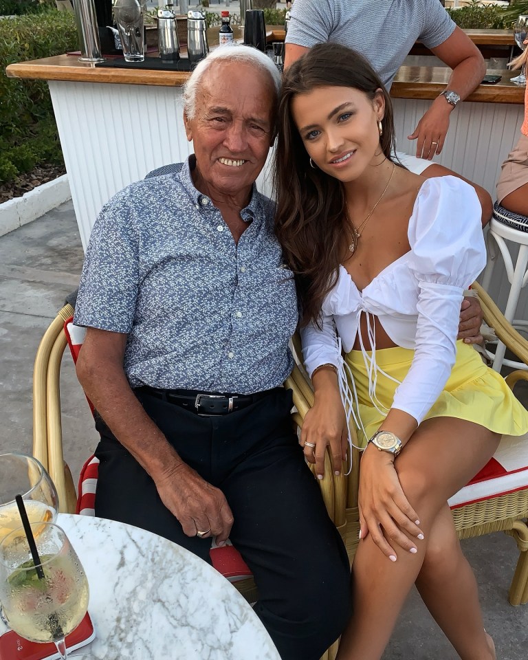 Mark Wright's youngest sister with their grandfather.