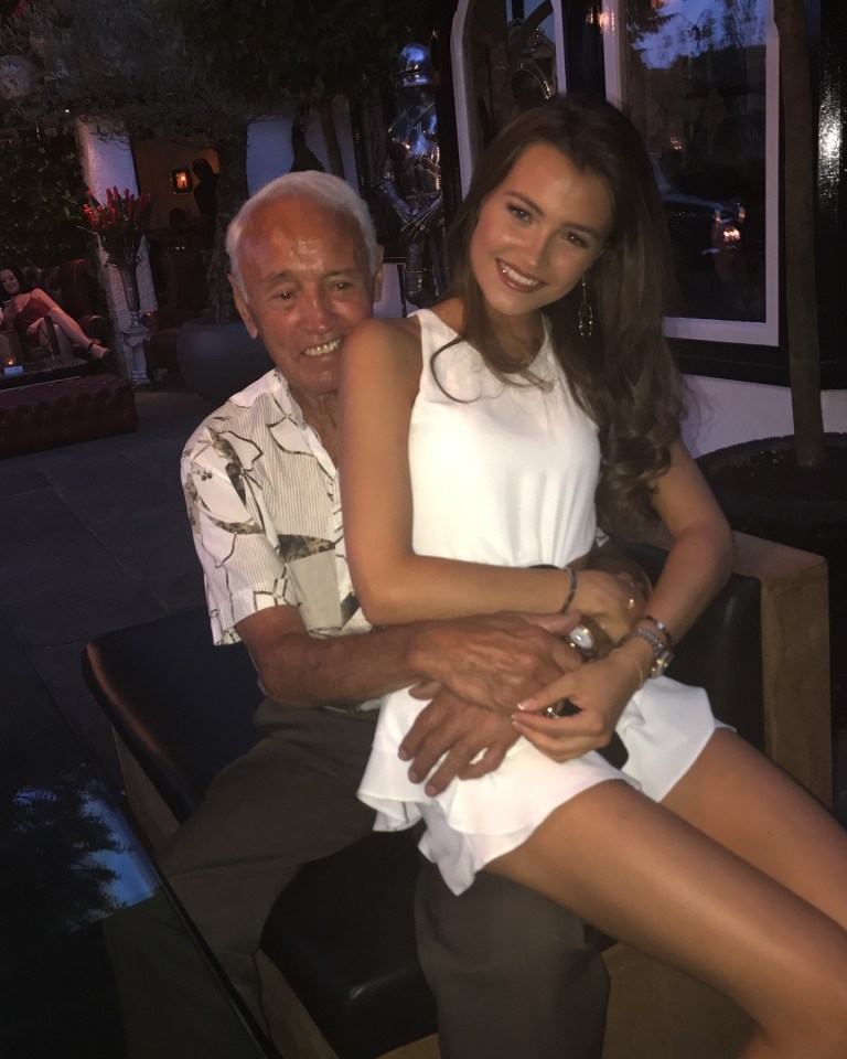 Mark Wright's youngest sister with their grandfather.