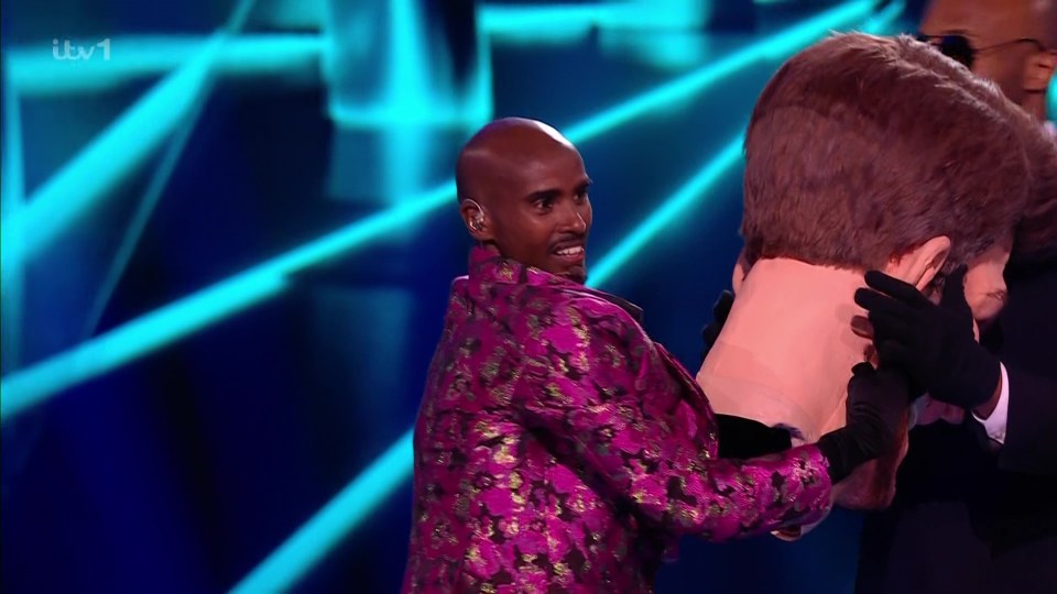 Mo Farah unmasked as Giant on The Masked Singer.