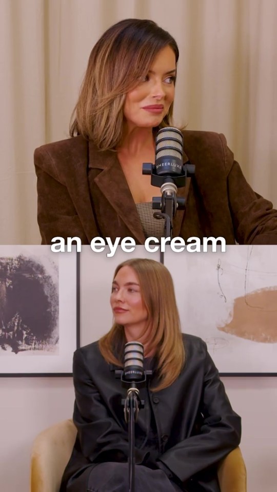 Two women discussing an eye cream.