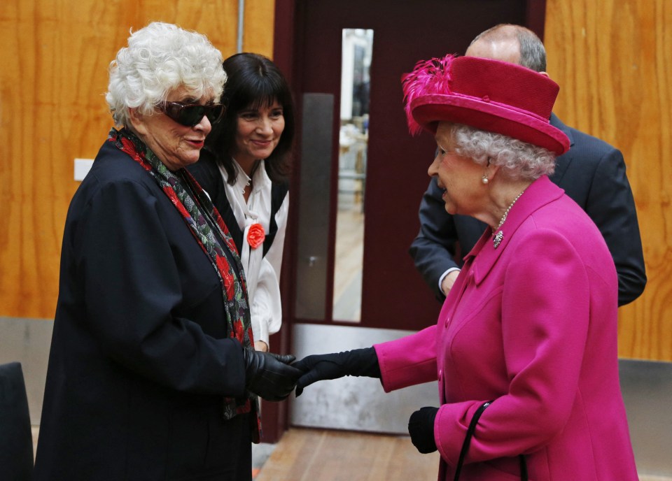 Queen Elizabeth II meets actress Joan Plowright at the National Theatre.