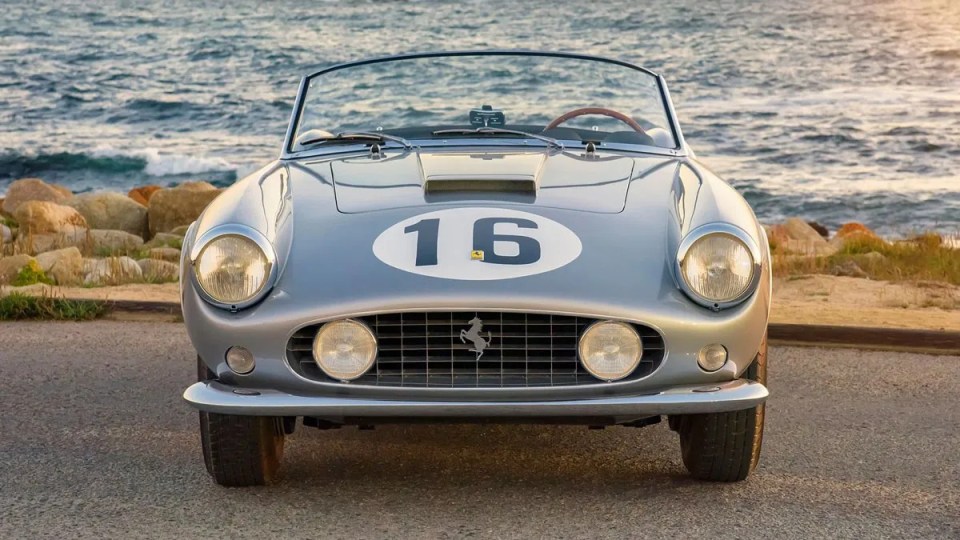 Silver 1959 Ferrari 250 GT California Spider with number 16.