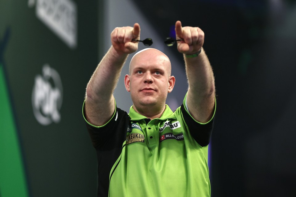 Michael van Gerwen celebrating a darts victory.