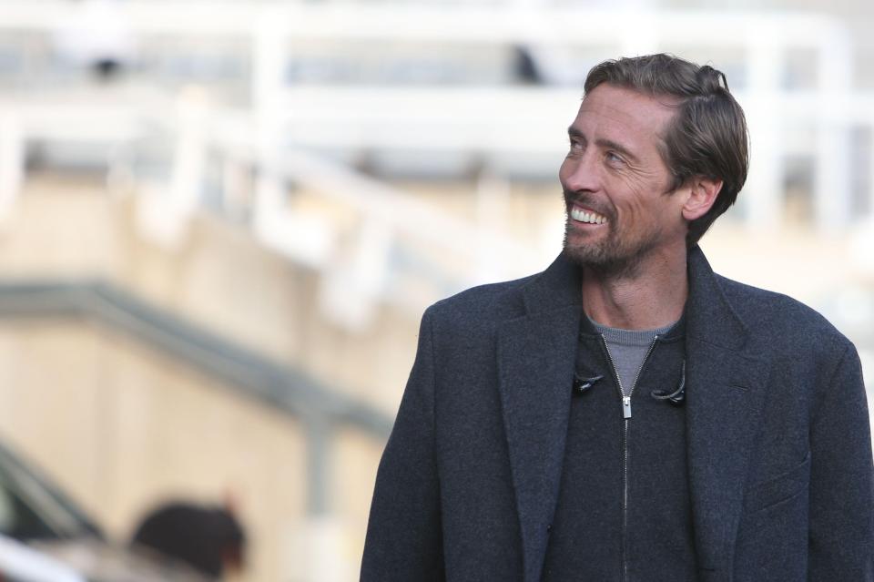 Peter Crouch, former Premier League footballer and TNT Sports pundit, smiling.