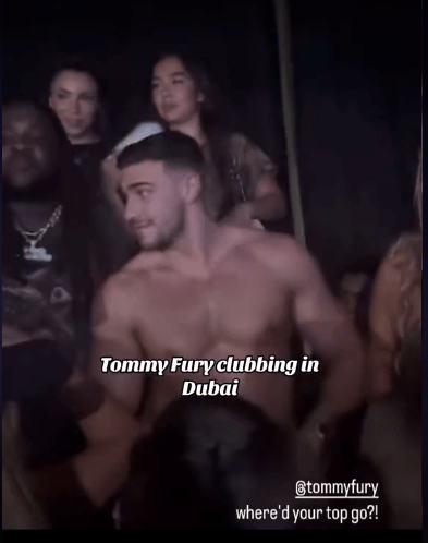 Tommy Fury shirtless at a Dubai nightclub.