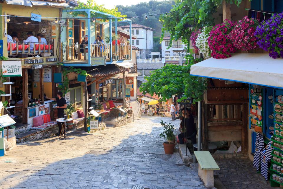 Old Bar, Montenegro street scene with souvenir shops and restaurants.