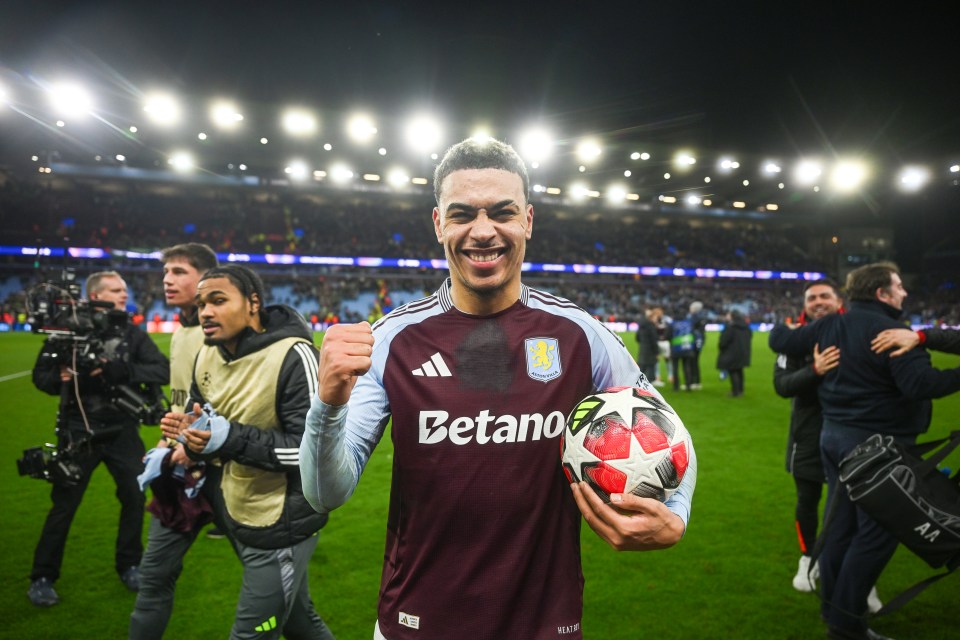 Morgan Rogers of Aston Villa celebrates a hat trick, holding the match ball.