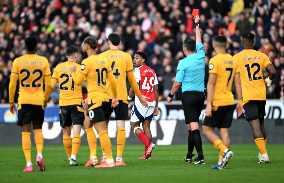 Arsenal's Myles Lewis-Skelly receives a red card.