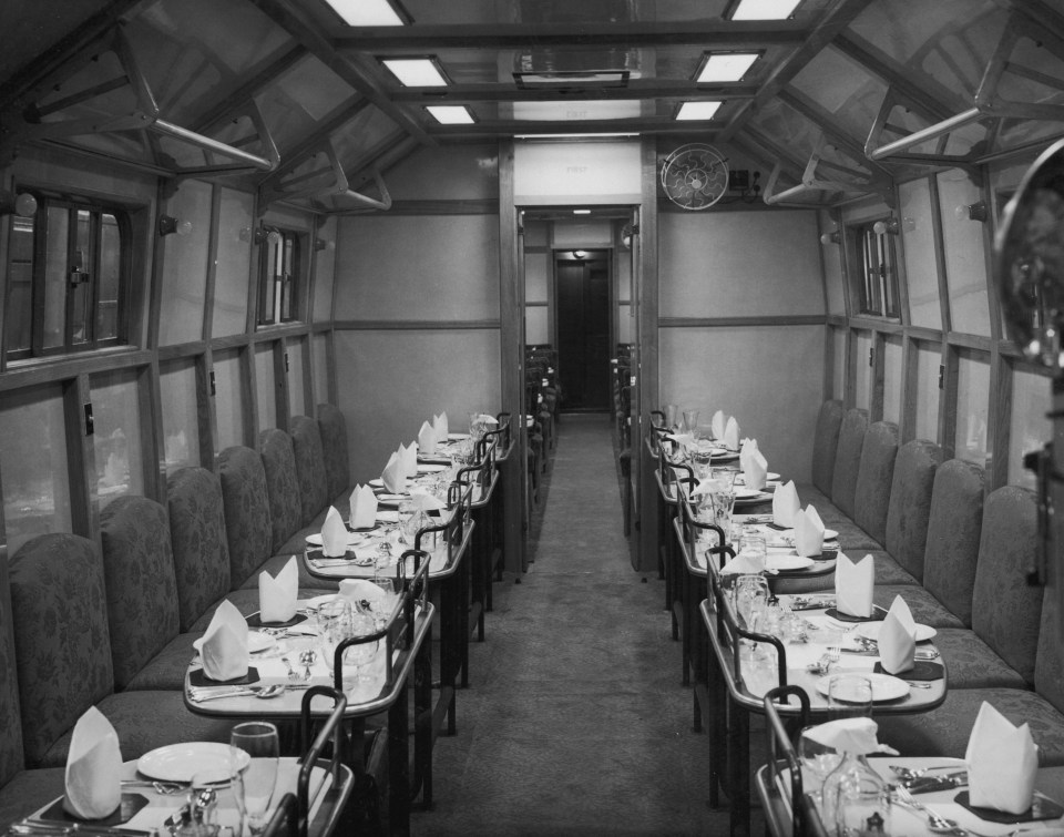 Interior of a British Railways restaurant car with tables set for diners.