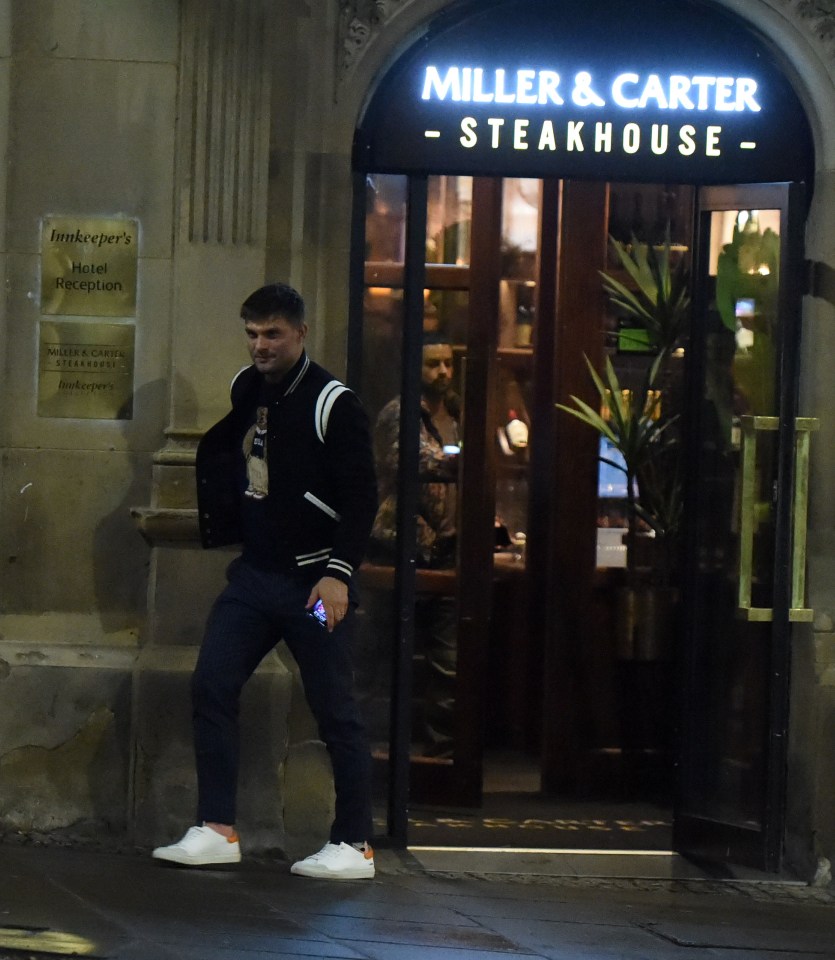 A man leaving Miller & Carter Steakhouse.