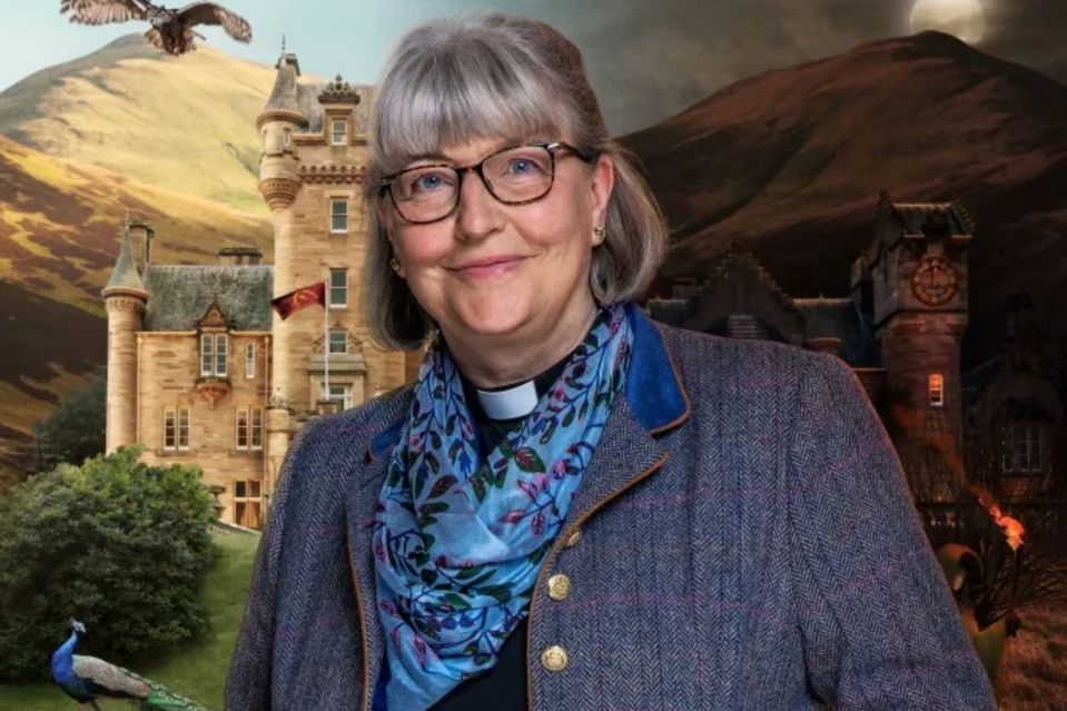 Portrait of Lisa, a woman wearing glasses and a clergy collar, with a castle in the background.