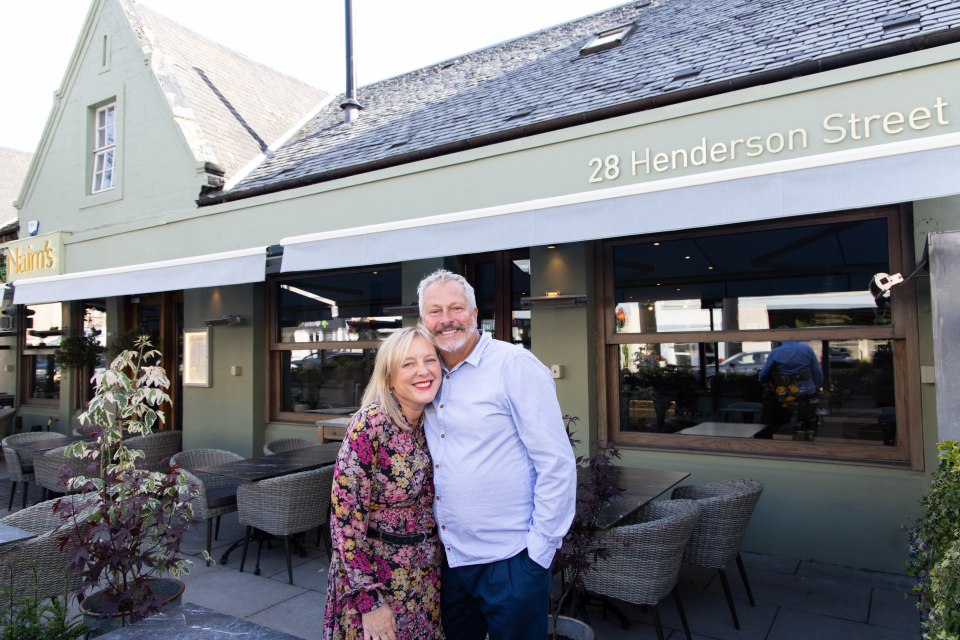 Nick and Julia Nairn standing outside their restaurant, Nairn's.