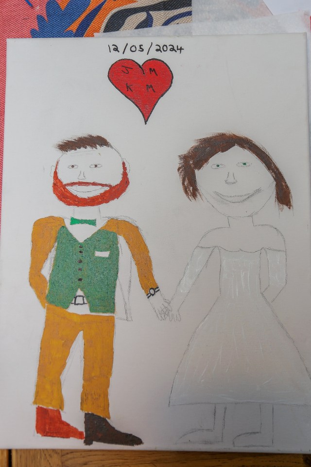 Illustration of a simple painting of a bride and groom.