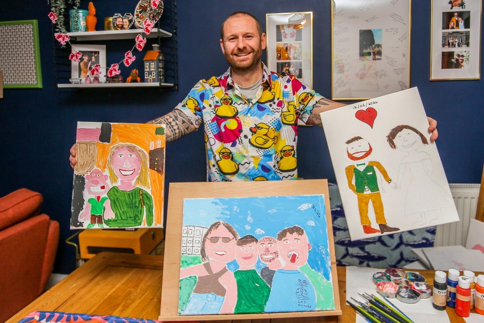 Man displaying his amateur paintings of family and friends.