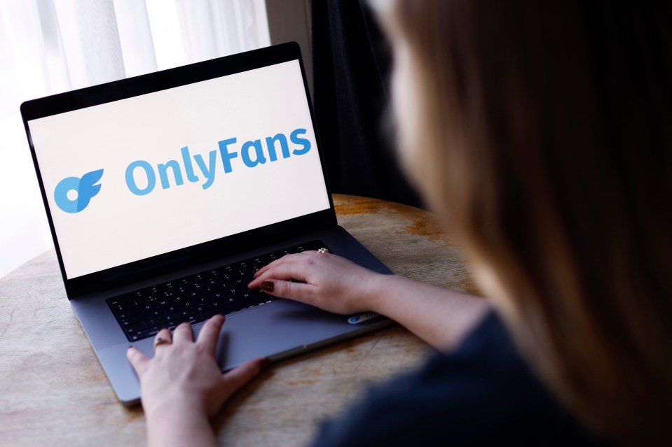 OnlyFans logo displayed on a laptop screen.