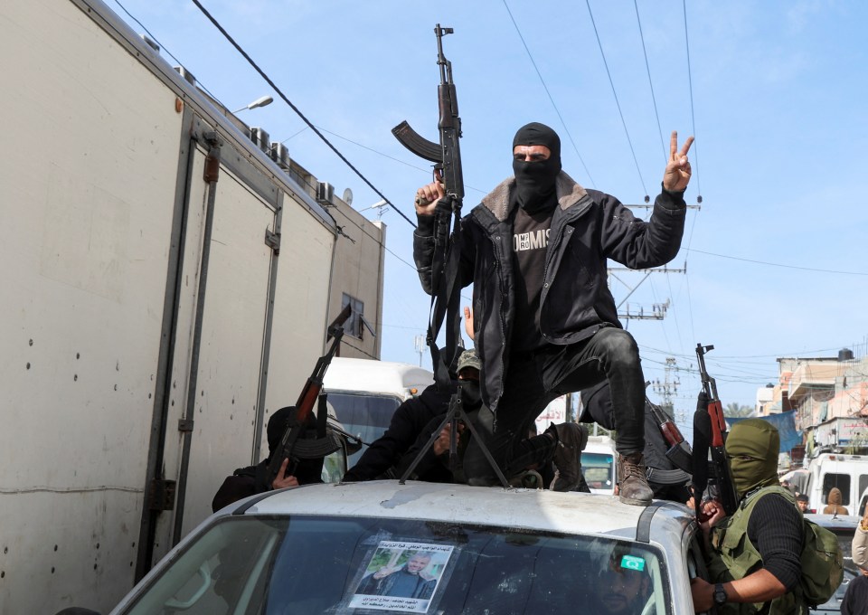 Hamas militants in Gaza celebrating a ceasefire with Israel.