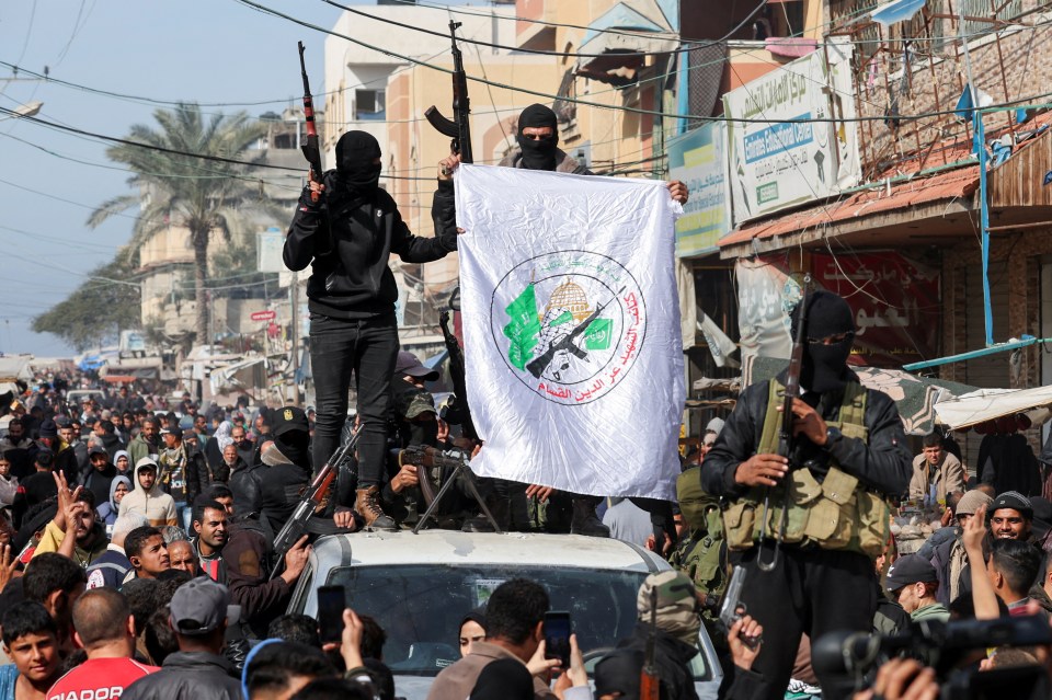 Palestinian Hamas militants in a celebratory parade following a ceasefire with Israel.