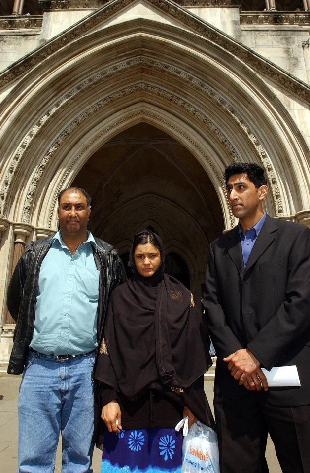 Parents of Zahid Mubarek, who died in a racist attack, outside the High Court.