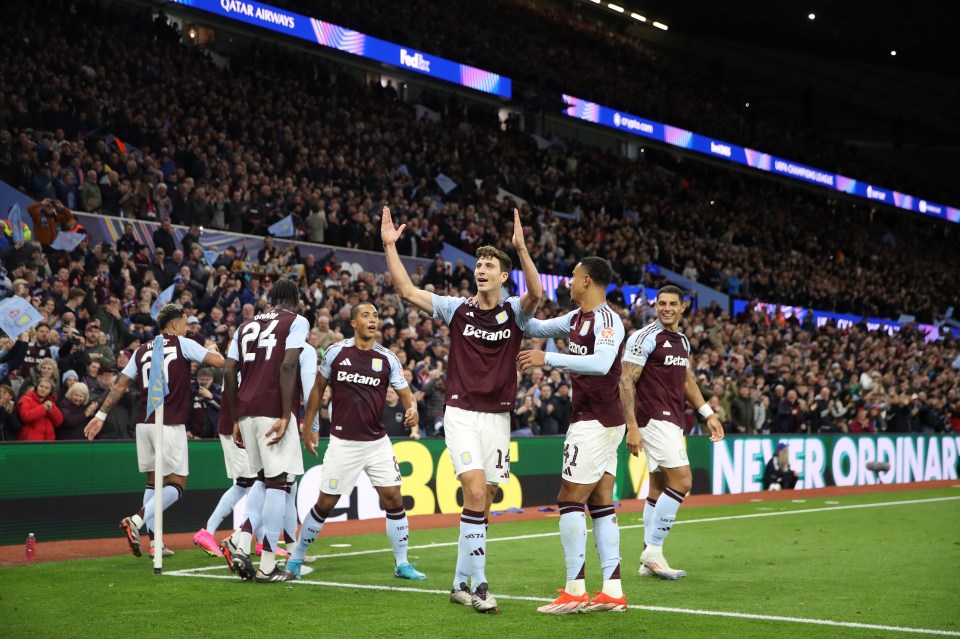 Aston Villa players celebrating a goal.