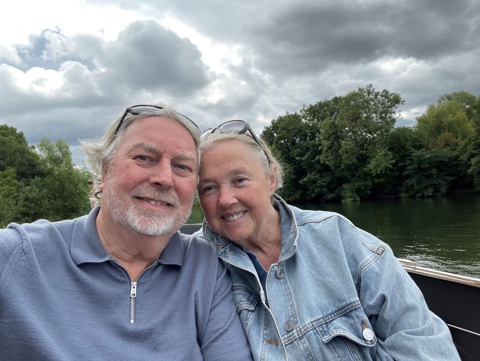 Pauline Quirke MBE and her husband on a boat.