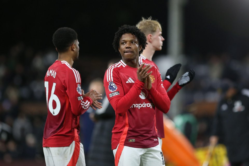 Tyrell Malacia of Manchester United applauding fans.