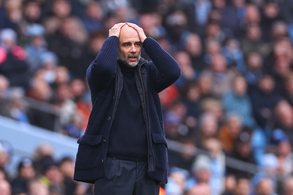 Pep Guardiola, manager of Manchester City, looking distressed during a soccer match.