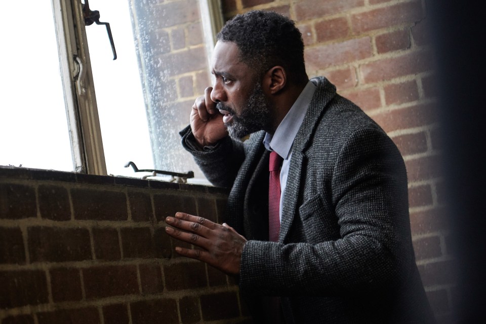 Idris Elba as DCI John Luther on a phone call.